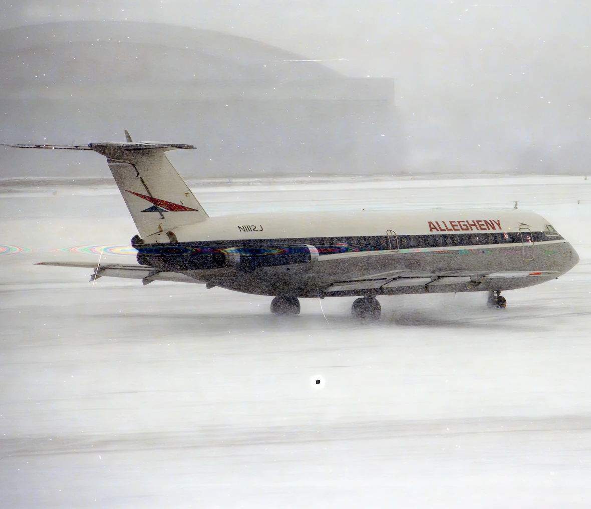 Aircraft taxiing in snowstorm